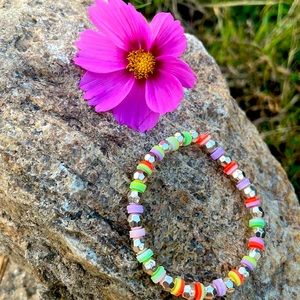 I am selling a clay bead bracelet that is homemade very simple vibrant colors!